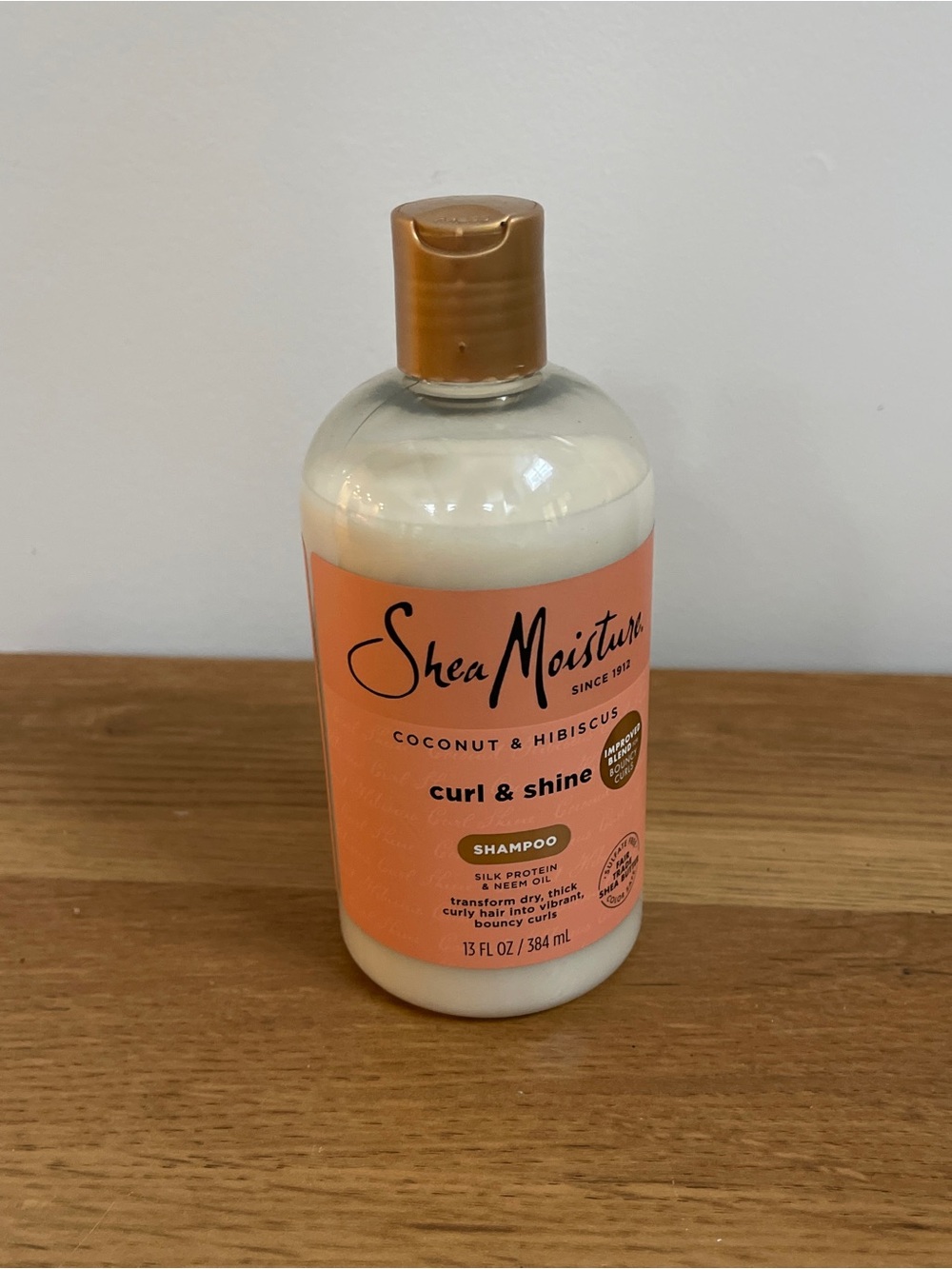 Shea Moisture Peach-Orange Curl & Shine Shampoo